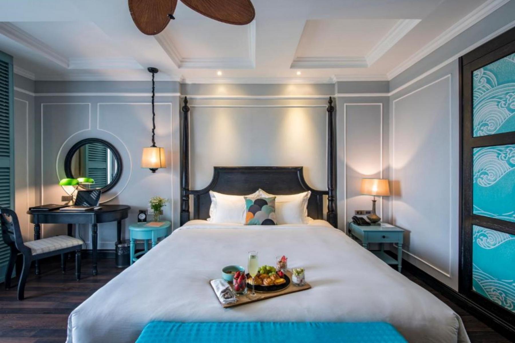 giường ngủ của Anio Boutique Hotel Hoian