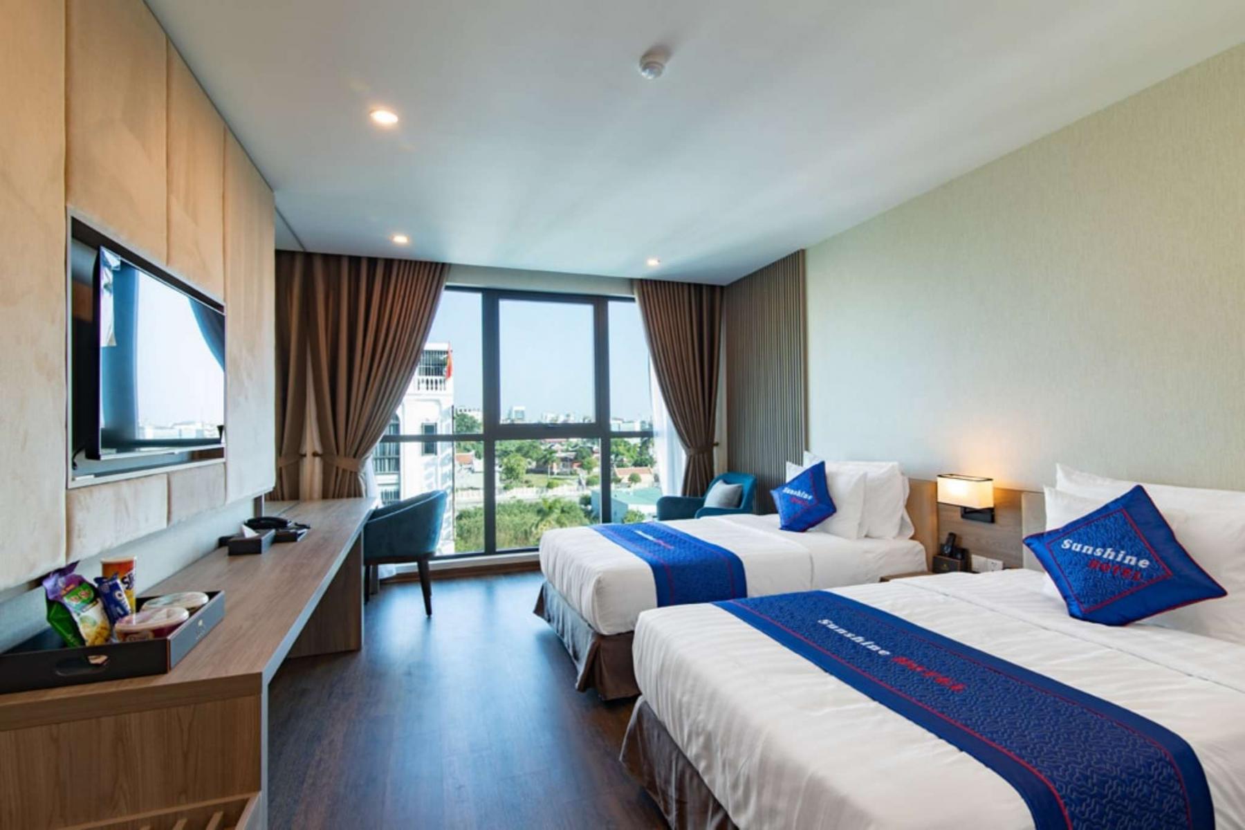 Đây là hạng phòng Deluxe với 2 giường nhỏ của Sunshine Hotel Móng Cái