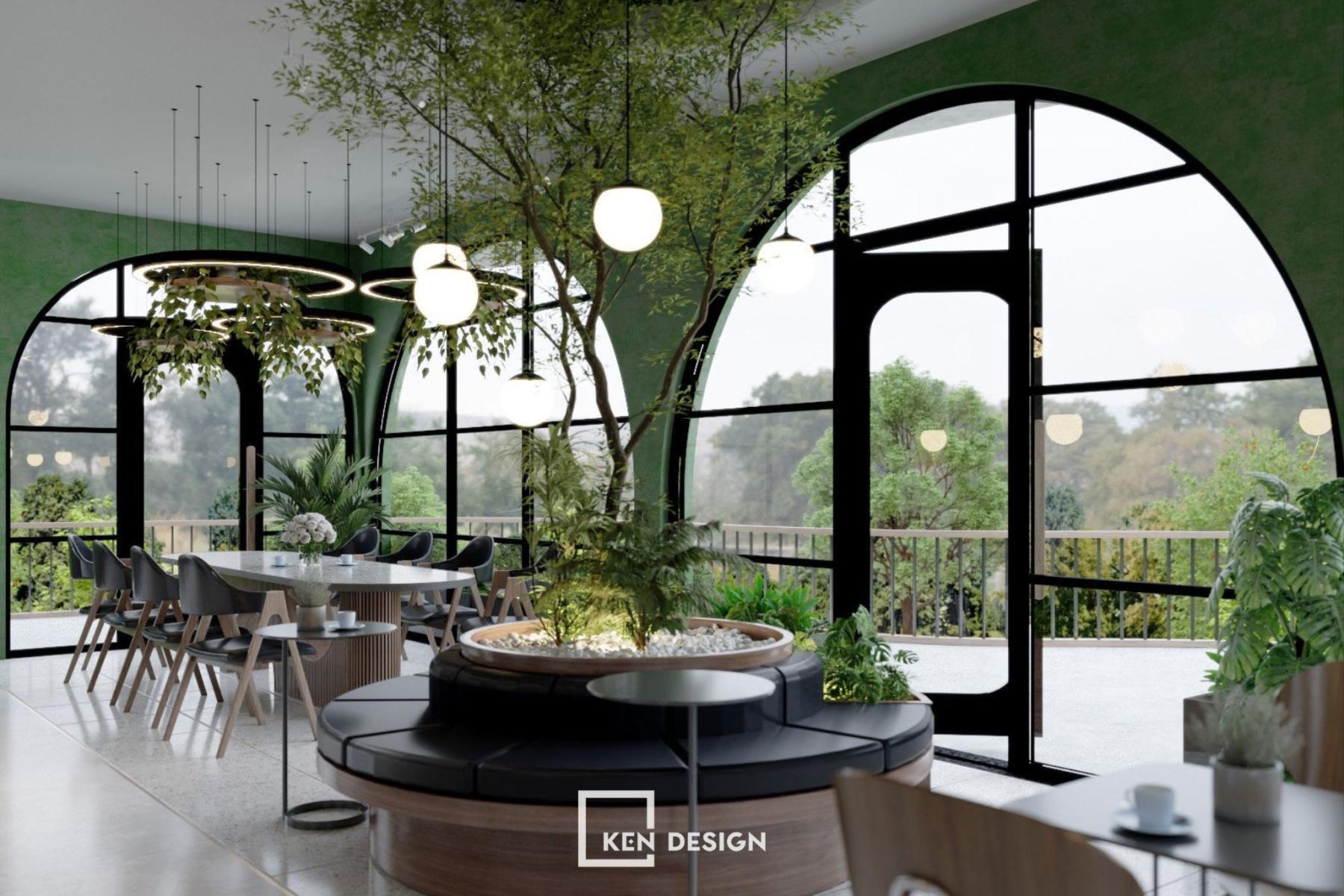 cây lớn đặt giữa bệ ngồi tròn dưới đèn cầu thả trong thiết kế quán cafe phong cách trẻ