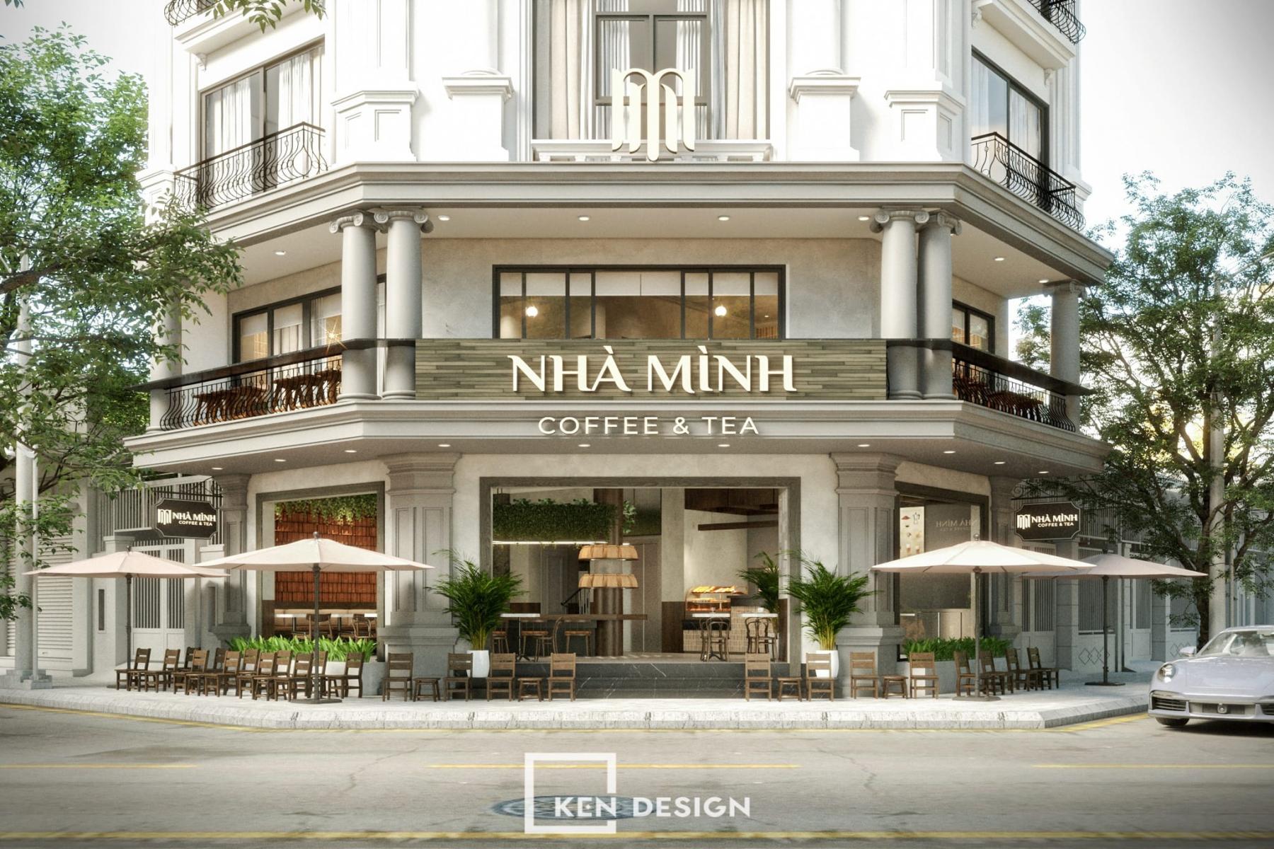 quán cafe 2 mặt tiền với dãy ghế gỗ và ô dù lớn trên vỉa hè